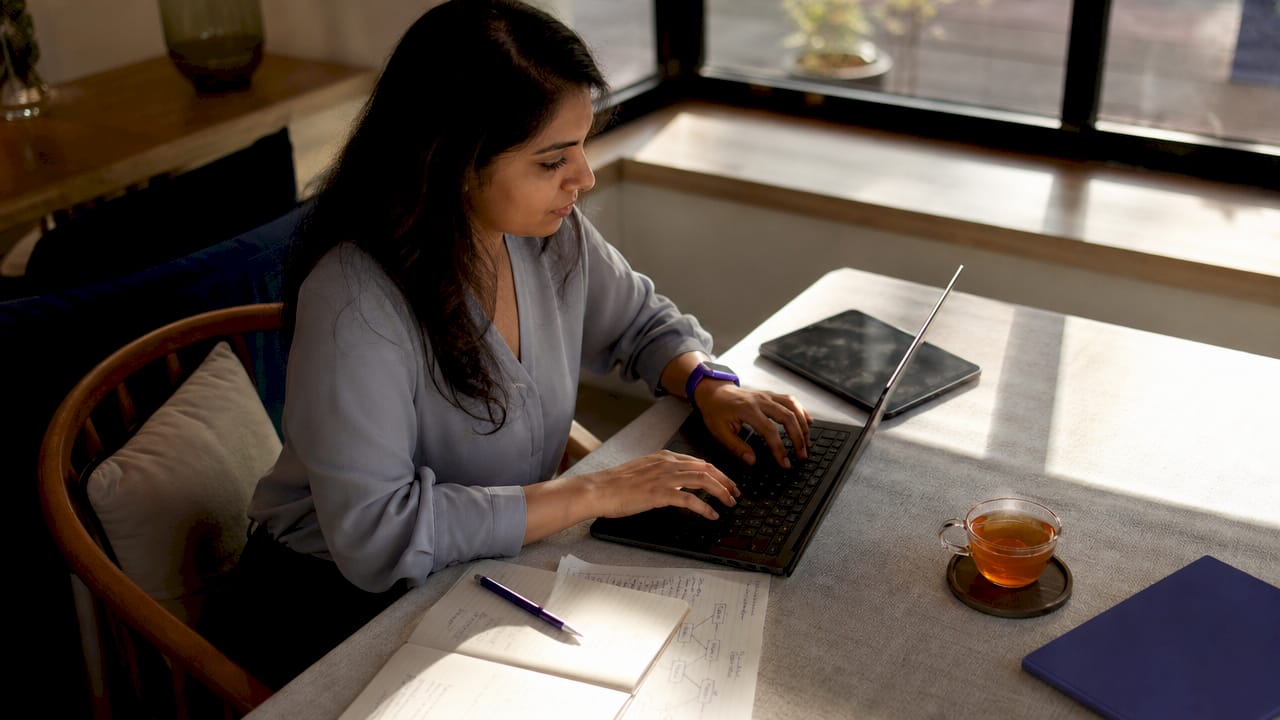 Customer support manager working on automation setup