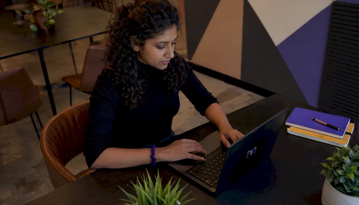 Woman configuring post-call survey software