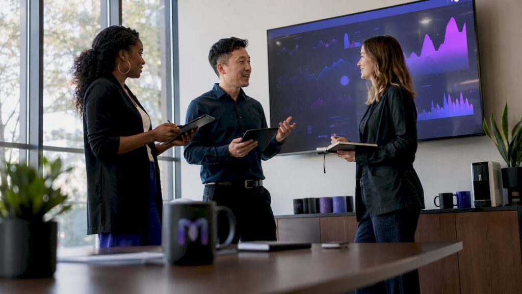 Contact center supervisors reviewing live analytics dashboard
