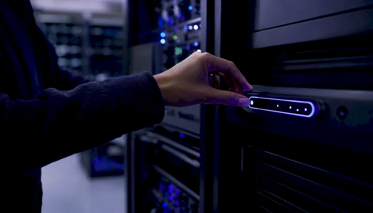 Hand adjusting AI compliance control panel