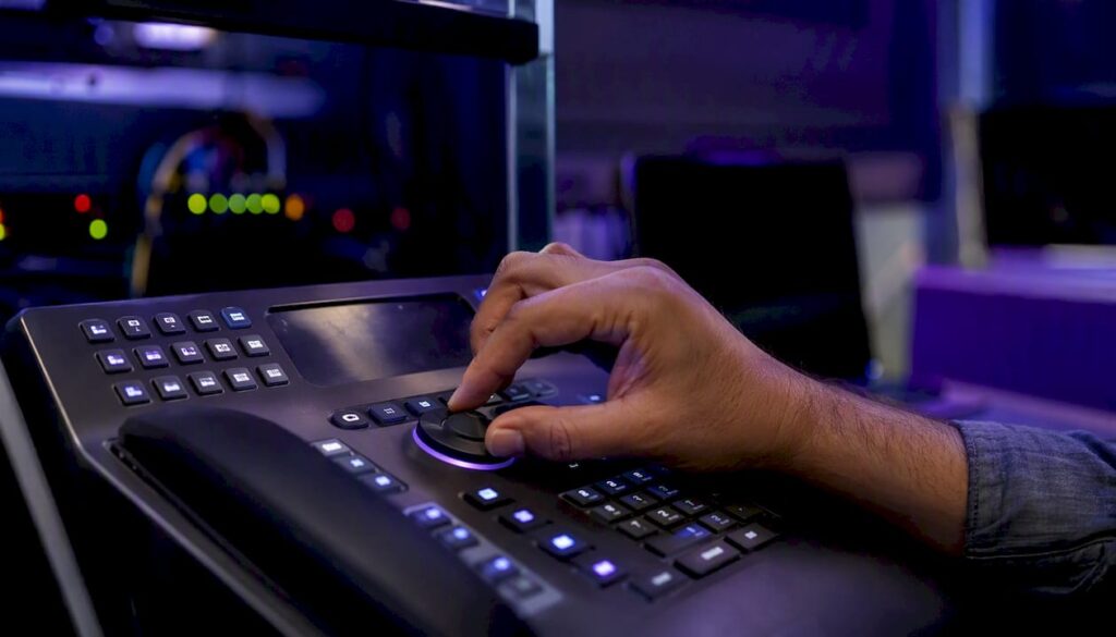 Hand adjusting telephony console buttons