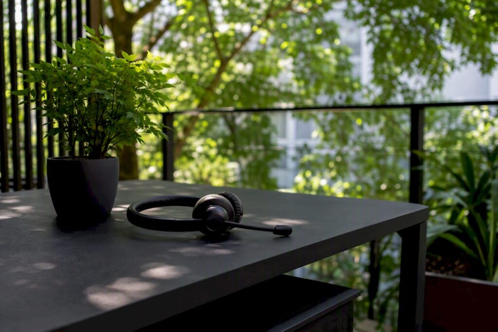 Contact center headset on dark desk