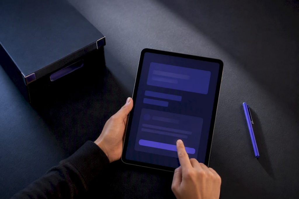 Hands reviewing chatbot data deletion request