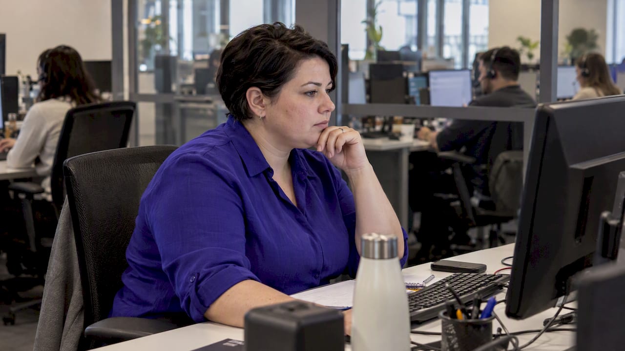 Manager reviewing call center performance baseline
