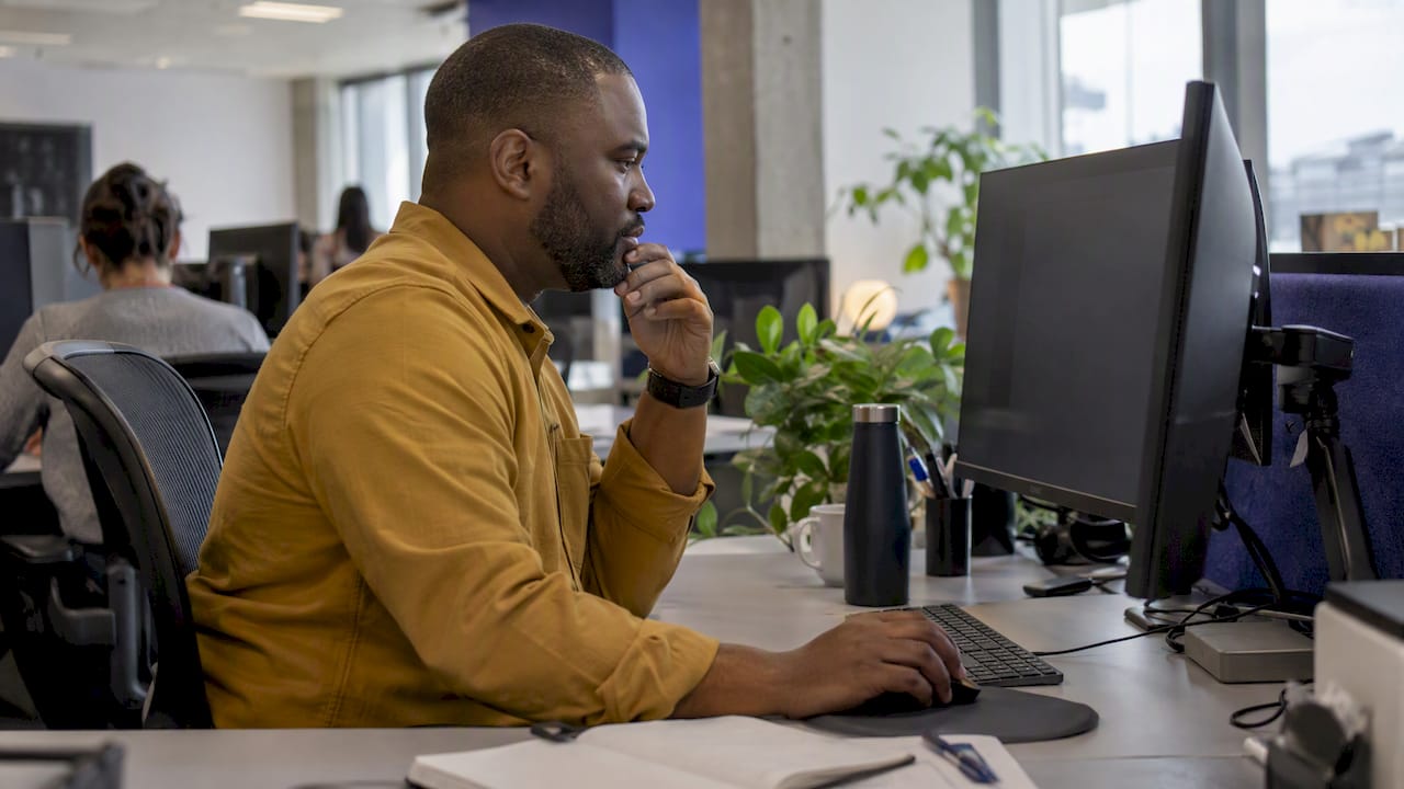 Manager reviewing customer support emails